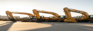 Chinese SANY and XCMG excavators compared with Japanese Komatsu and CAT machines at equipment yard - brand comparison guide 2026