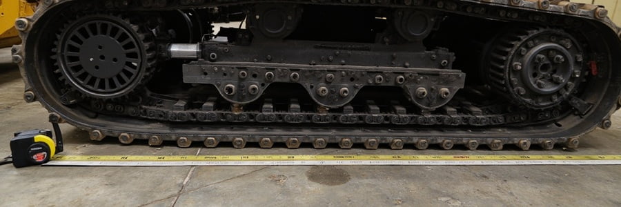 Undercarriage rollers and sprockets measured before packing