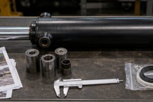 Excavator hydraulic cylinder quote evidence with rod pin seal and measurements