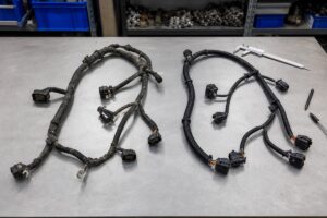 Excavator wiring harness old and new comparison