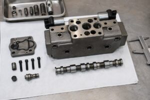 Excavator hydraulic valve manifold opened for pressure relief valve comparison