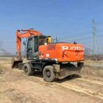 HITACHI ZX210W used excavator photo 1