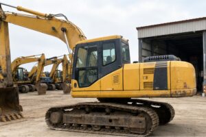 Used Komatsu excavator style yard walkaround before import