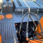Upper platform and hydraulic hose details on the refurbished Doosan DX210W
